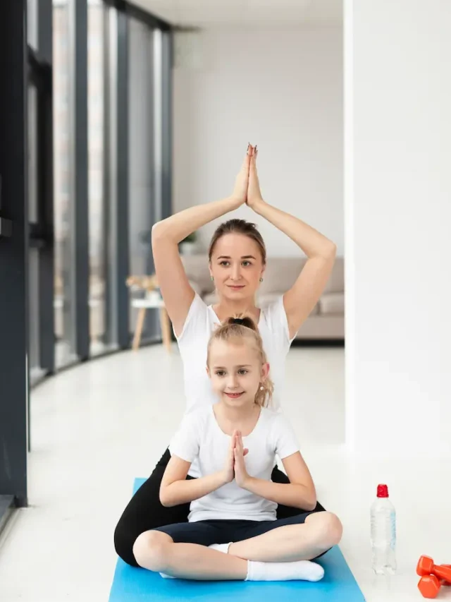 yoga-pose-with-mother-daughter-home